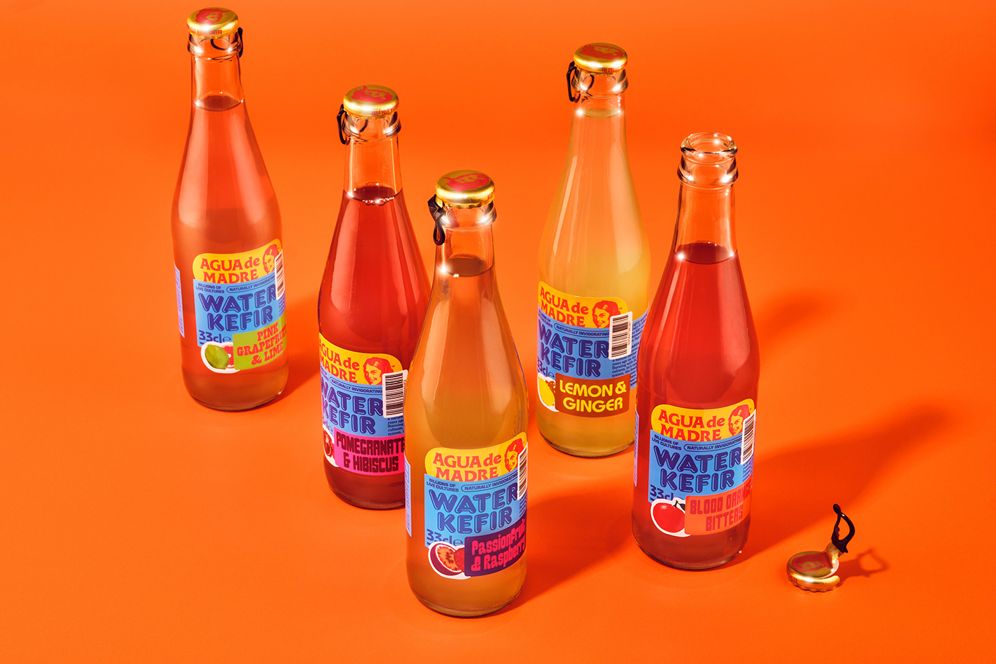 Logotype, typography, animation and packaging for fermented sparkling kefir water Agua de Madre designed by Chris Chapman. 
