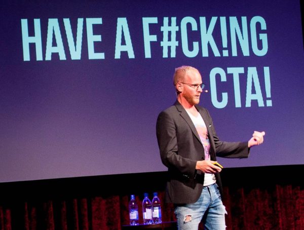 Oli Gardner speaking at Learn Inbound (and emphasizing the importance of CTAs).