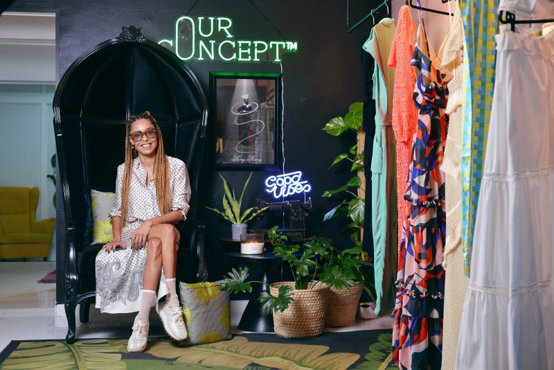 Brand ambassador sitting with products content creation